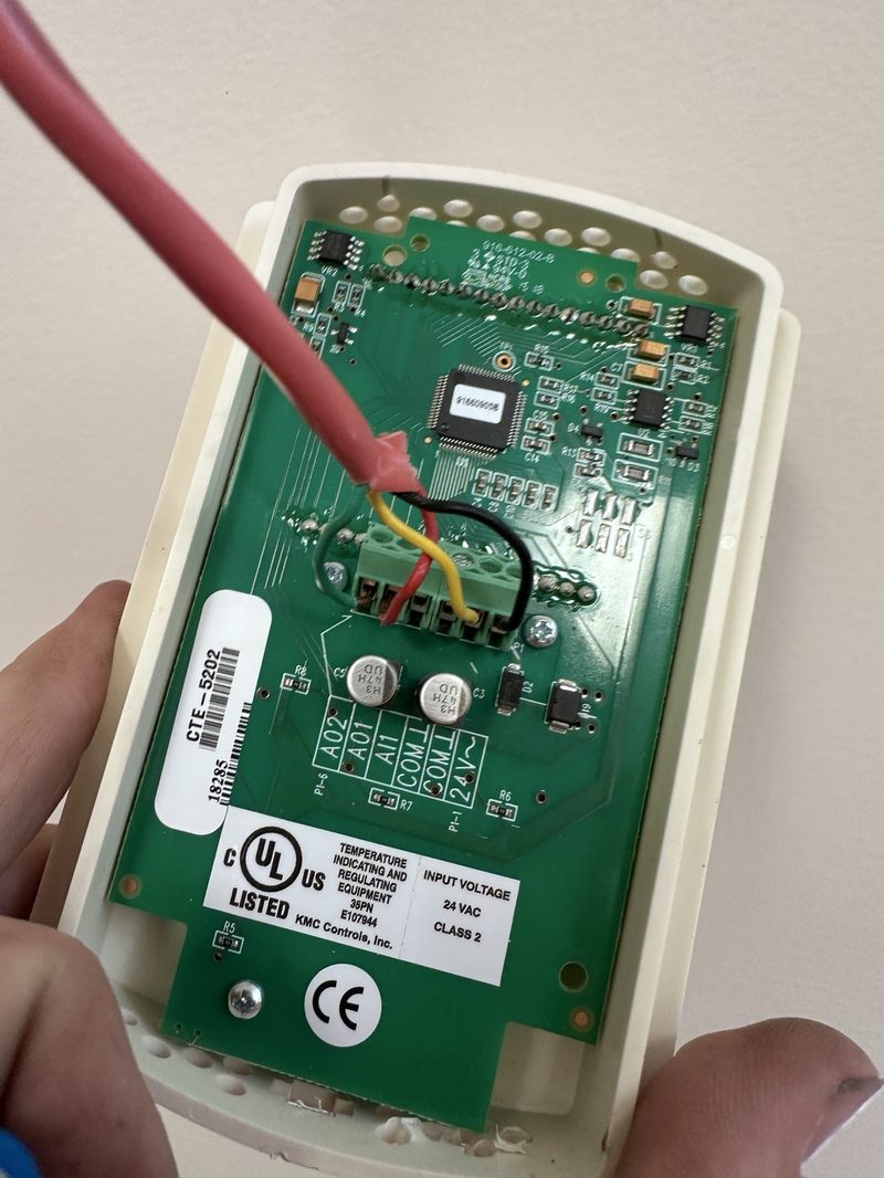 Wall-mounted thermostat and heating controls